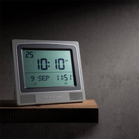 Réveil Azan CW-15 AlFajr, appareil électronique avec écran numérique et fonctions de prière musulmane, en plastique blanc.