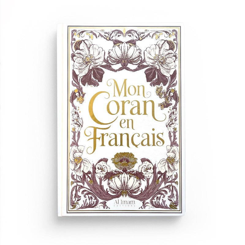 Coran en français expliqué Édition Al Imam, livre blanc et rose avec texte arabe et traduction française.