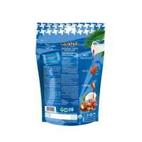 Dattes Chocodate Noix de Coco avec chocolat et noix de coco râpée, en emballage blanc, vue rapprochée.