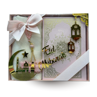 Coffret Eid Mubarak avec Coran arabe-français, tapis de prière et tasbih, édition Sana, image du coffret élégant.