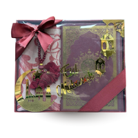 Coffret Eid Mubarak avec Coran arabe-français, tapis de prière et tasbih, édition Sana, design élégant et traditionnel.
