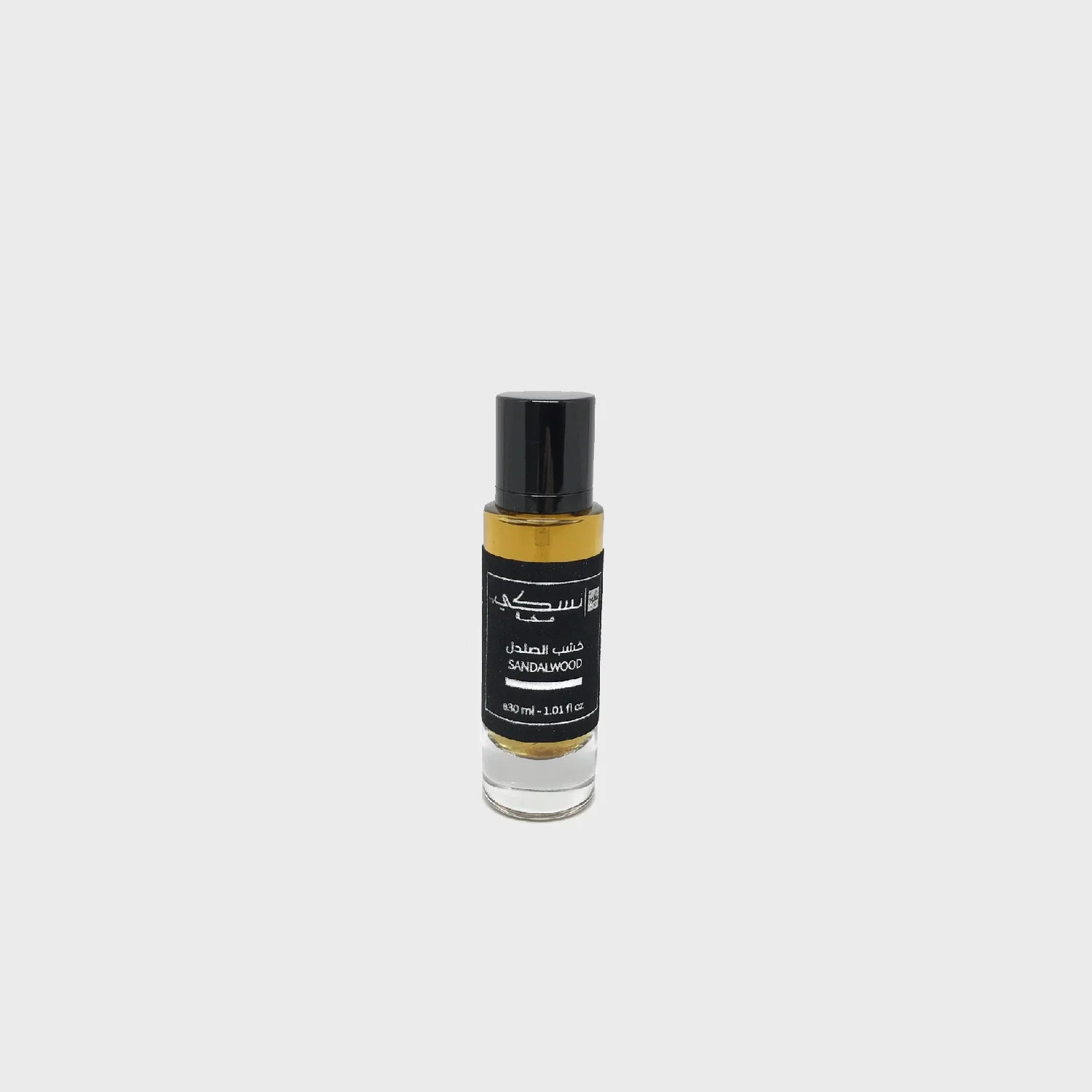 Parfum Nusuki Sandalwood de 30 ml avec flacon élégant, mettant en valeur le parfum bois de santal naturel.