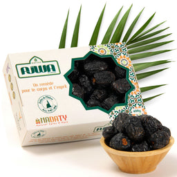 Dattes Ajwa de Médine bio de la marque Nadaty, visibles dans leur emballage, avec des dattes foncées et ridées.