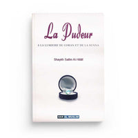 Livre "La Pudeur - À la Lumière du Coran et de la Sunna" de Dar Al Muslim, couverture avec texte en arabe et design sobre.