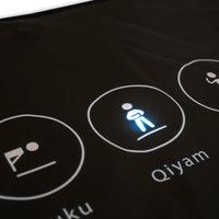 Tapis de prière interactif intelligent My Salah Mat pour adultes, avec design moderne et surface texturée pour la prière.