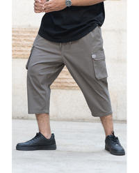Pantalon sarouel cargo WASSAT pour homme en kaki, noir ou beige, confortable et stylé, vêtement décontracté.