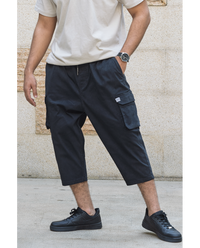 Pantalon sarouel cargo WASSAT pour homme en noir, kaki ou beige, tissu confortable, style décontracté et tendance.
