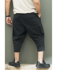 Pantalon sarouel cargo WASSAT pour homme en noir, beige ou kaki, avec coupe confortable et style décontracté.