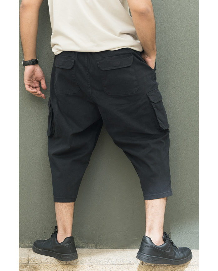 Pantalon sarouel cargo WASSAT pour homme en noir, beige ou kaki, avec coupe confortable et style décontracté.