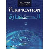 Livre "La Purification" de Pixelgraf avec couverture illustrée, visible en gros plan.