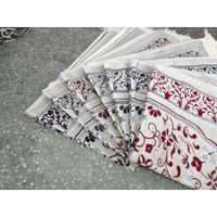 Tapis de prière Sana Edition avec motif jardin, fond blanc et couleur bleu ardoise, décoratif et confortable pour la prière.