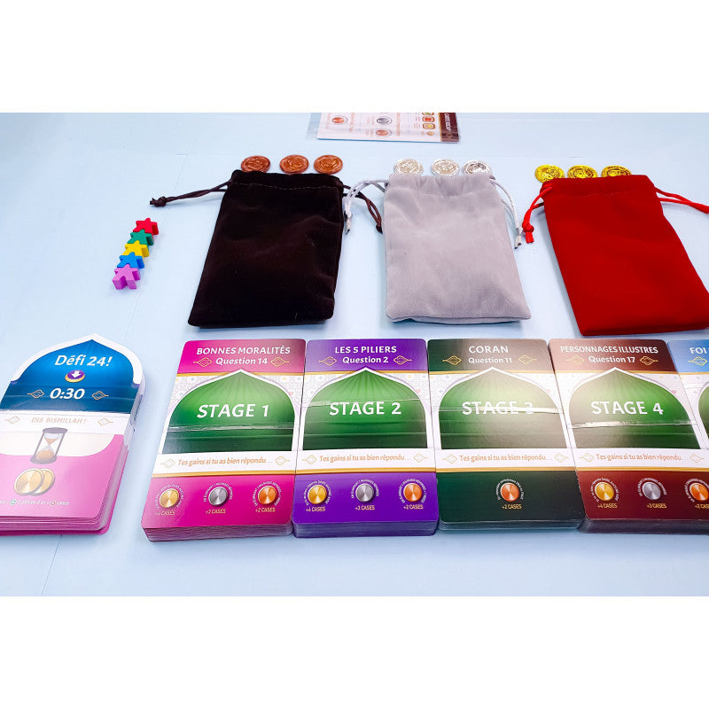Jeu de société éducatif Hassanates Village par SanaKids, pour enfants et adultes de 7 à 99 ans, avec plateau coloré et pièces.