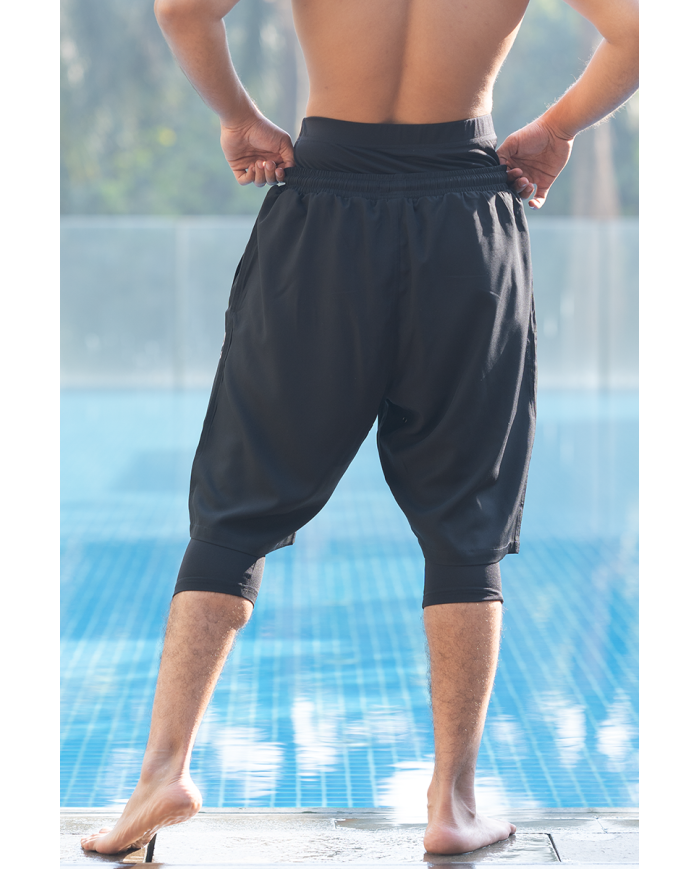 Short de bain pour homme WASSAT Akwatik en noir, bleu et vert, vêtement de plage léger et confortable pour homme.
