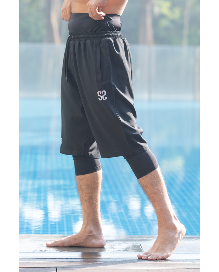 Short de bain pour homme WASSAT Akwatik en noir, bleu ou vert, tissu léger et confortable pour la plage ou la piscine.